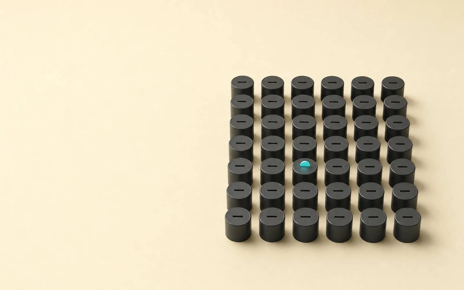 NanoCorp review: a grid of identical dark coin tins, all untouched, with a single glowing teal coin dropping into just one